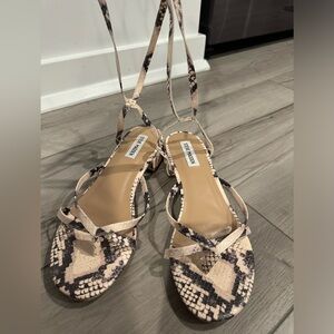 Steve Madden wrap-up sandals with small heel.